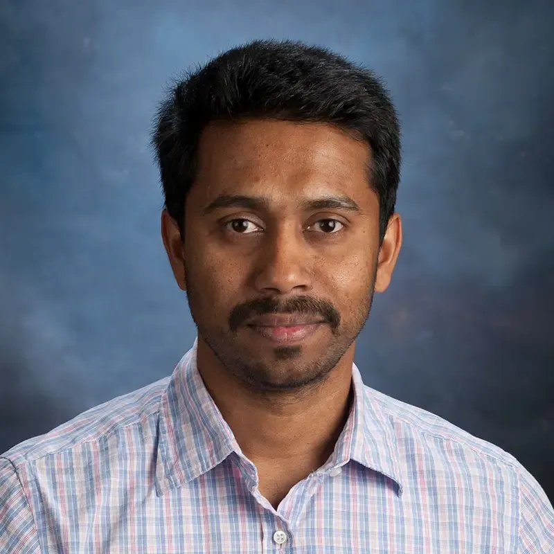 Headshot of Johny Augustine